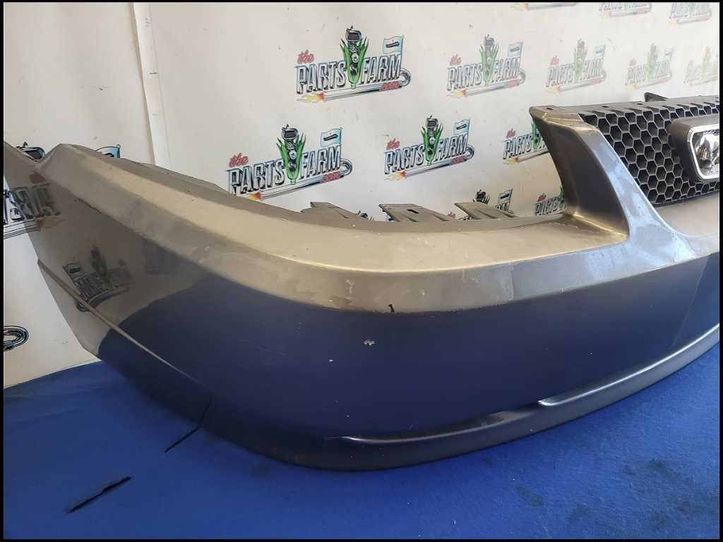 1999 - 2004 Ford Mustang GT Front Cover Bumper Grill Lights Mount Paint TK 2640 - The Parts Farm