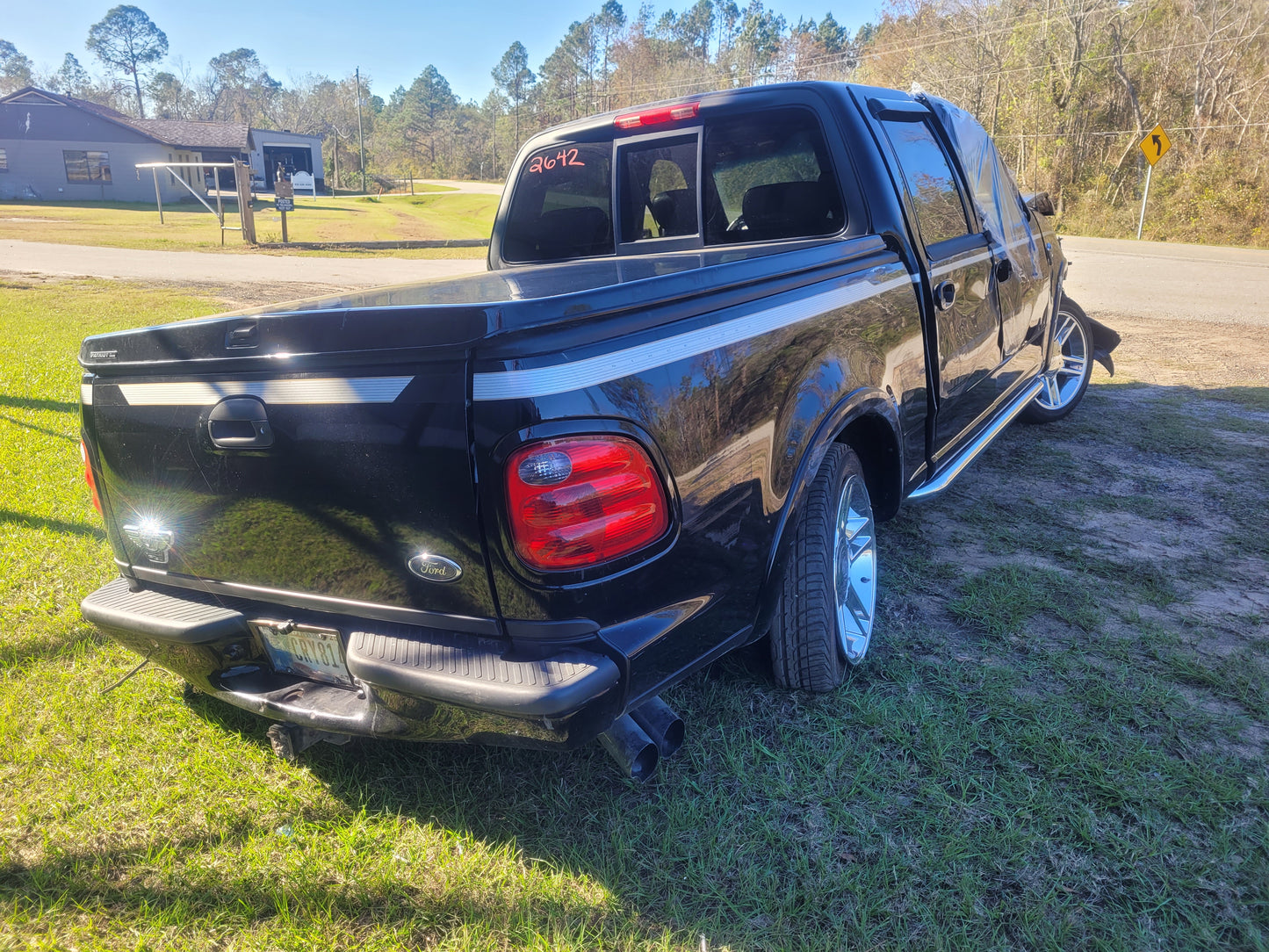 Stock 2642. 2003 Ford F150 Harley Davidson 5.4L SC Engine 4R100 Auto Trans Clear Title 90k Miles - The Parts Farm
