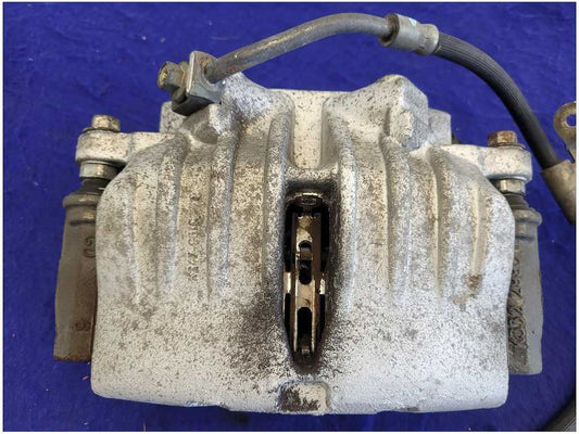 2003-2006 Chevrolet SSR Pickup Truck Driver Front Brake Caliper Pad Hose 2682