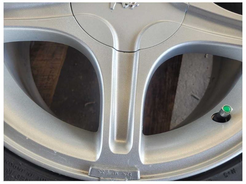 1994-2004 Ford Mustang GT Wheel 17x8 5 Spoke Silver Tire 2561 - The Parts Farm