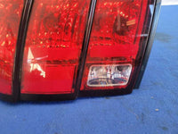 1999 - 2004 Ford Mustang GT Passenger Rear Taillight Lamp Light Lens 2474 - The Parts Farm