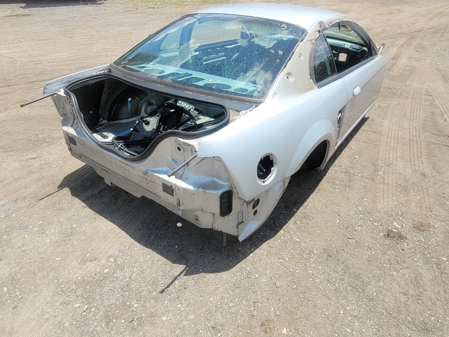 Stock 2573. 2004 Ford Mustang Cobra Coupe Salvage Title Frame Shell