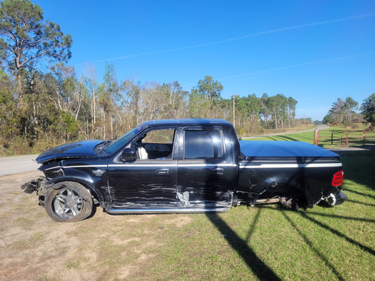 Stock 2642. 2003 Ford F150 Harley Davidson 5.4L SC Engine 4R100 Auto Trans Clear Title 90k Miles - The Parts Farm