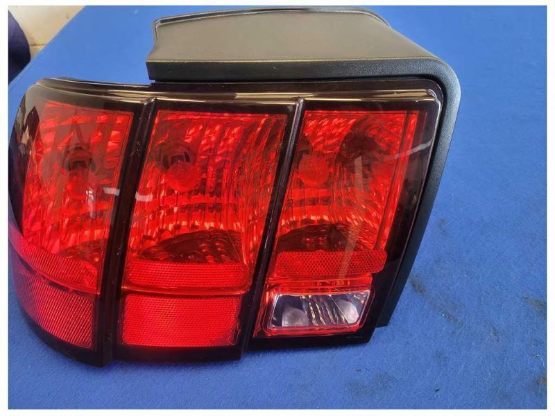 1999-2004 Ford Mustang GT 4.6L Driver Rear Taillight Lamp Lens 2561 - The Parts Farm
