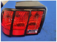 1999-2004 Ford Mustang GT 4.6L Driver Rear Taillight Lamp Lens 2561 - The Parts Farm
