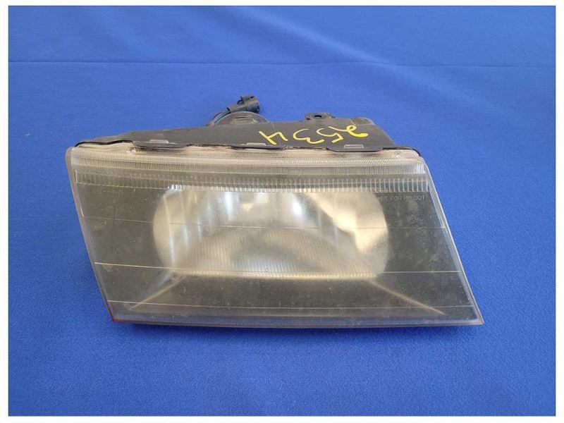 2003-2004 Mercury Marauder 4.6L 4v Passenger Front Headlight *Faded* 2534 - The Parts Farm