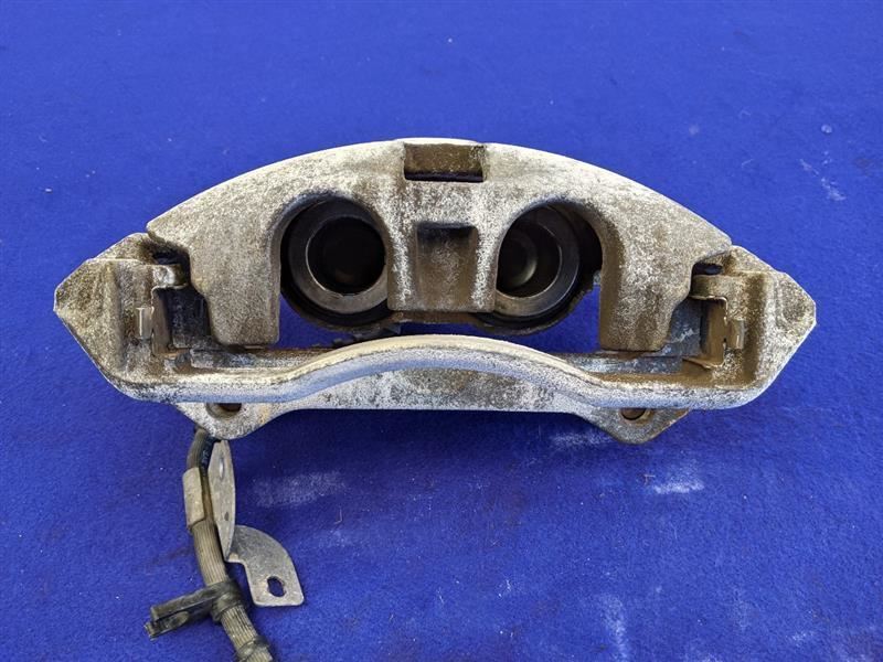 2015-2019 Ford F-150 Pickup Truck Driver LH Front Brake Caliper Line Piston OEM - The Parts Farm