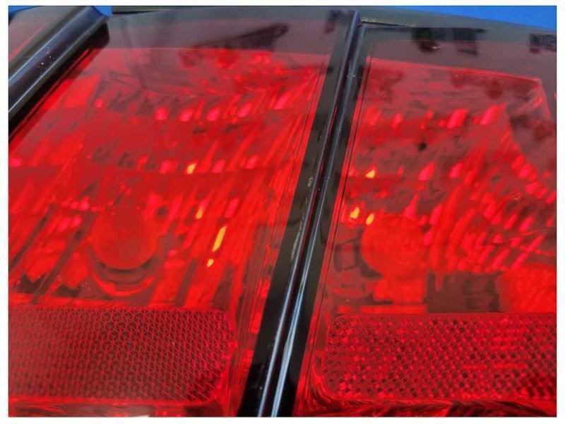 1999-2004 Ford Mustang GT 4.6L Driver Rear Taillight Lamp Lens 2561 - The Parts Farm