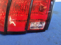 1999-2004 Ford Mustang GT Passenger Rear Taillight Lamp Light Lens 2474 - The Parts Farm