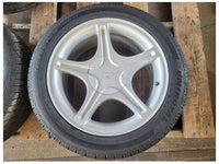 1994-2004 Ford Mustang GT Wheel 17x8 5 Spoke Silver Tire 2561 - The Parts Farm