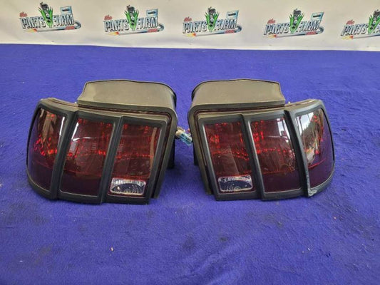 1999-2004 Ford Mustang Cobra SVT DOHC Pair Tinted Taillight Brake Lens Lamp 2312 - The Parts Farm