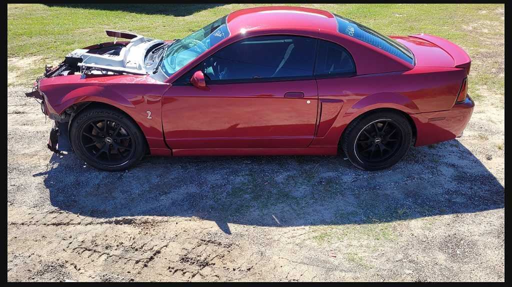 2003-2004 Ford Mustang Cobra SVT DOHC 4.6L Driver Knee Kick Panel Steering 2260 - The Parts Farm