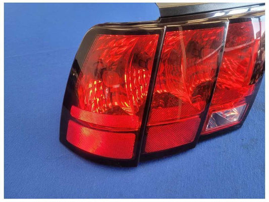 1999-2004 Ford Mustang GT 4.6L Driver Rear Taillight Lamp Lens 2561
