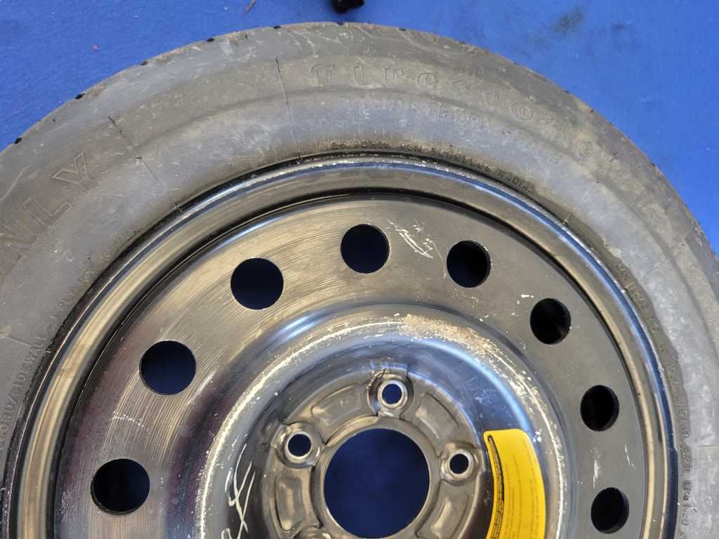 1994-1995 Ford Mustang GT Emergency Wheel 15x4 Spare Tire Black Paint 2631 - The Parts Farm